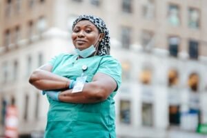 A picture of a nurse standing.